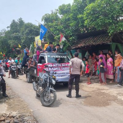 Polsek Sajira Melaksanakan Pengawalan dan Pengamanan Kampanye Bersama Pilkades di Desa Paja