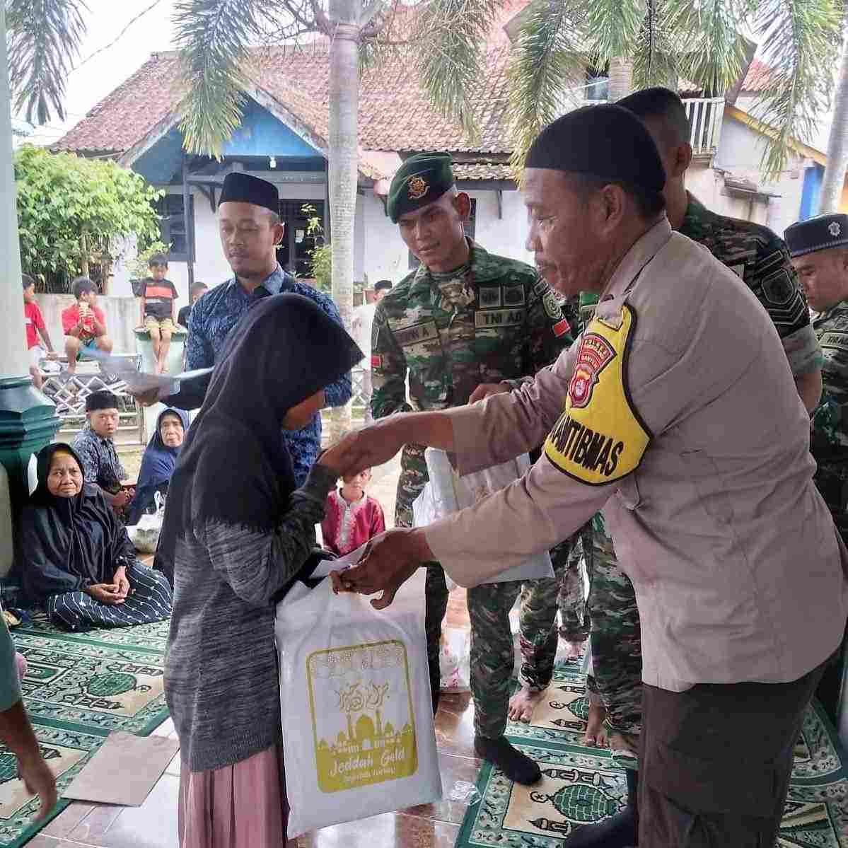 Bhabinkamtibmas Polsek Cadasari Hadiri Acara Santunan Anak Yatim Dalam Rangka Hari Juang Kartika