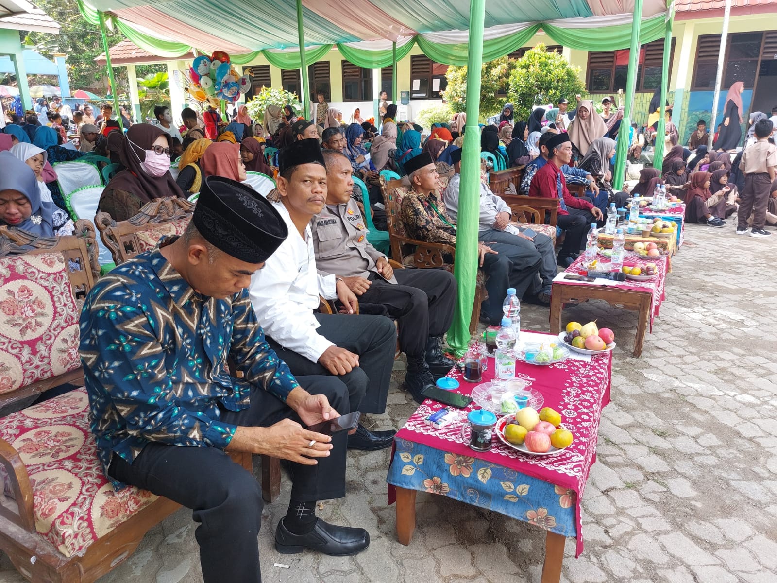 Kapolsubsektor Tunjung Teja Polres Serang Hadiri Kegiatan Pembukaan Perlombaan KSN, FLS2N, dan KOSN Se Kecamatan Tunjung Teja