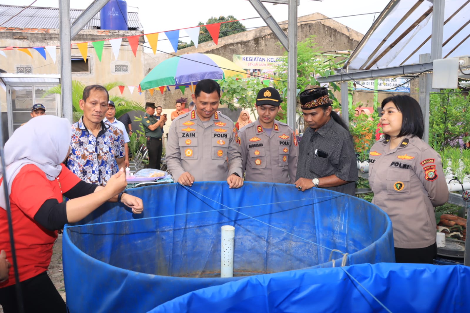 Kapolres Metro Tangerang Kota Berikan Bibit Ikan Lele untuk Masyarakat Kampung Tangguh Bebas Narkoba