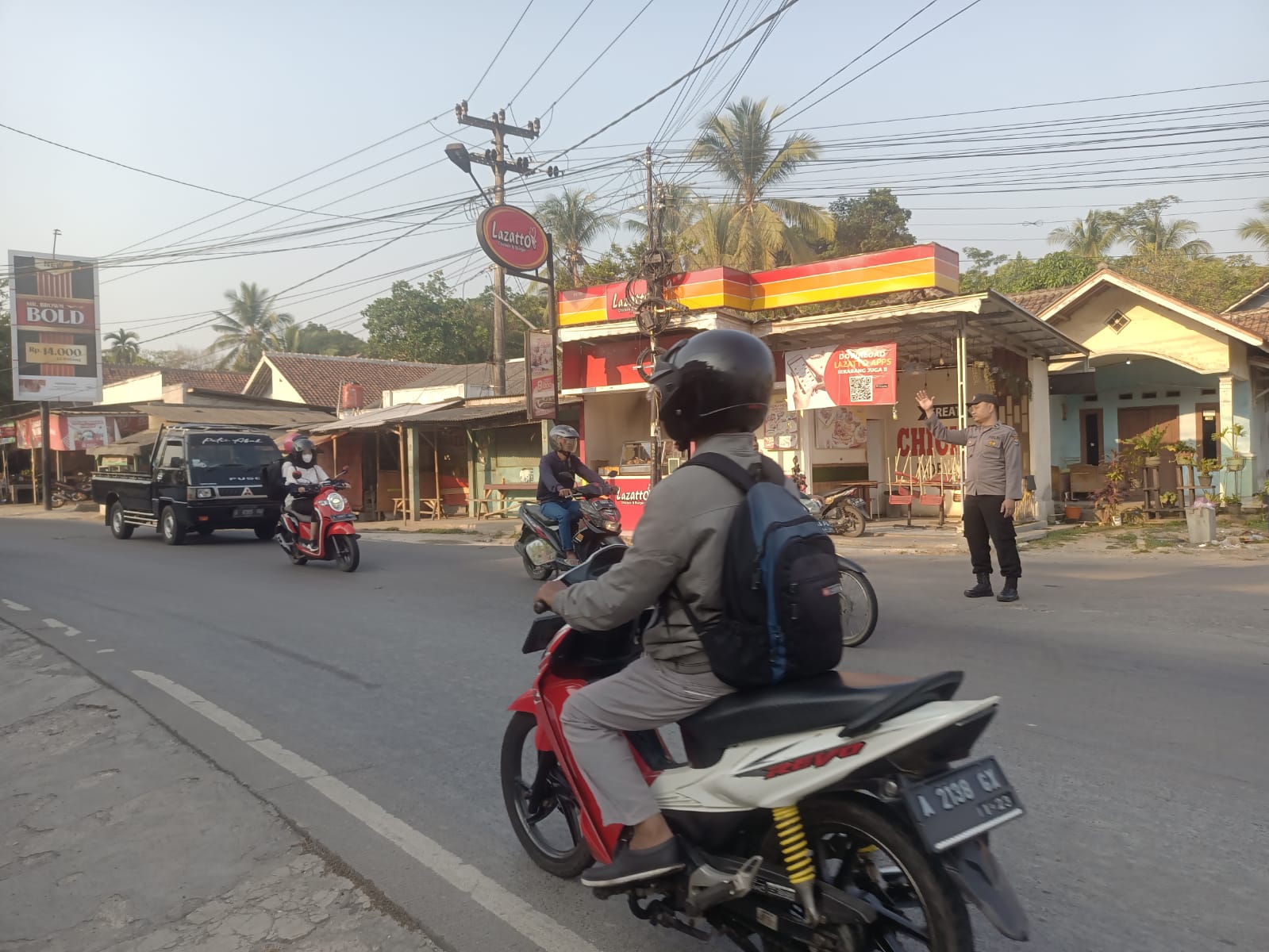 Pengaturan Arus Lalin Dalam Memberikan Pelayanan Kemasyarakat Oleh KA SPK Polsek Petir Dengan Strong Poin Pagi