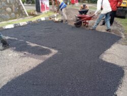 TJSL BRI BO Cibinong Bangun Jalan Aspal 2.200 m² di Desa Tangkil